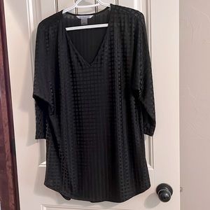 Peter Nygard black top